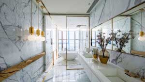 Renovated hotel luxury bathroom with light fixtures