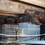 Leaking damaged subfloor shower before repair