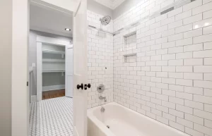 A well lighted bathroom that is mould free